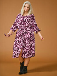 Plus size clothing – ONLY Cartyla Dress in mauve wine print with v-neckline, button front, ribbon tie, and 3/4 sleeves.