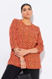 Ulla Popken graphic top in paprika orange with geometric print, keyhole neckline, and 3/4 sleeves
