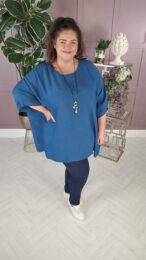 Teal Kaftan Style Top with round neckline, dropped sleeves, and relaxed free-size fit – styled by Michelle’s Curvy Boutique.