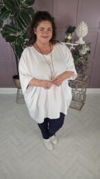 White Kaftan Style Top with round neckline, wide short sleeves, and relaxed free-size fit – soft woven fabric from Michelle’s Curvy Boutique.