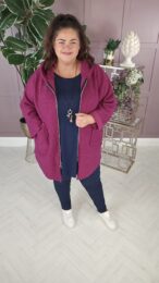 Danny Magenta Teddy Coat with hood, zip front, and plush teddy texture – soft wool-blend outerwear from Michelle’s Curvy Boutique.