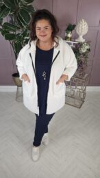 Danny White Teddy Coat with hood, zip front, and plush teddy texture – soft wool-blend outerwear from Michelle’s Curvy Boutique.