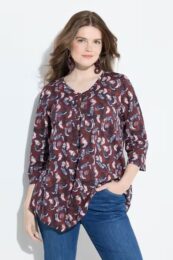 UllaPopken Cowboy Tee (Ruby) – ruby red cotton top with cowboy boot print, rounded V-neck, 3/4 sleeves, and asymmetric pointed hemline.