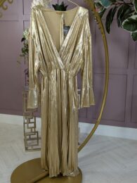 The Gold Party Shelly Dress – gold shimmer faux wrap midi dress with 3/4 sleeves, optional tie belt, and pockets from Michelle’s Curvy Boutique.