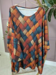 Amber Weave Swing Tunic – warm amber woven-look swing tunic with flattering shape and soft stretch feel from Michelle’s Curvy Boutique.