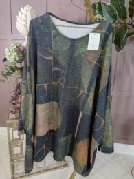 Forest Mosaic Swing Tunic – green and brown mosaic-print swing tunic with soft stretch fabric and flowing drape from Michelle’s Curvy Boutique.