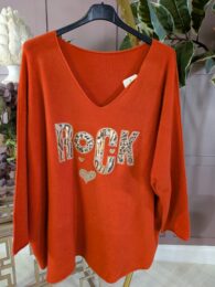 Orange Rock Knitted Jumper – bright orange knit with V-neck, ¾ sleeves, dropped shoulders, and sequined ROCK motif with mixed animal prints.