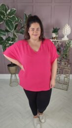 ONLY Carmetta TShirt in pink with V-neck, short sleeves, dropped shoulders and button closure at the back