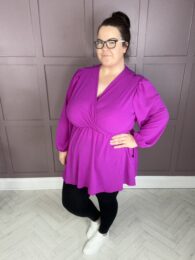The Amy Top (Fuchsia) faux wrap V-neck balloon sleeve A-line top with pockets in bright fuchsia