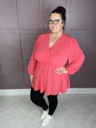 The Amy Top (Coral) faux wrap V-neck balloon sleeve A-line top with pockets in bright coral