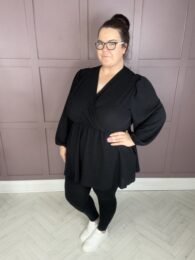 The Amy Top (Black) faux wrap V-neck balloon sleeve A-line top with pockets in classic black