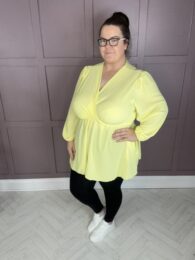 The Amy Top (Lemon) faux wrap V-neck balloon sleeve A-line top with pockets in soft lemon yellow