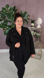 black faux suede jacket with zip detail and soft stretchy fit on model