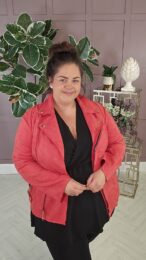 red faux suede jacket with zip detail and soft stretchy fit on model